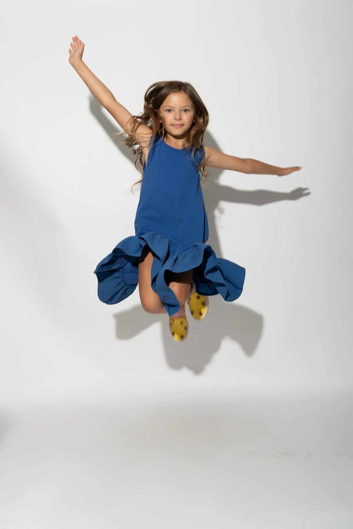 NAVY SLEEVELESS FLOUNCE DRESS