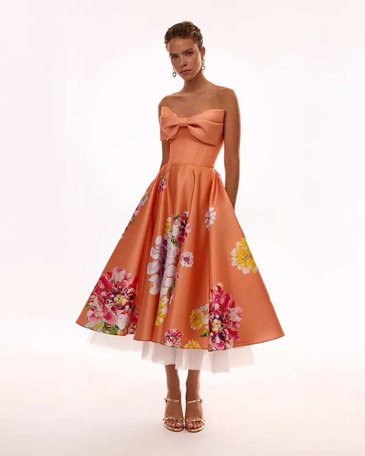 Playful orange floral midi dress with bow, Glow-Up