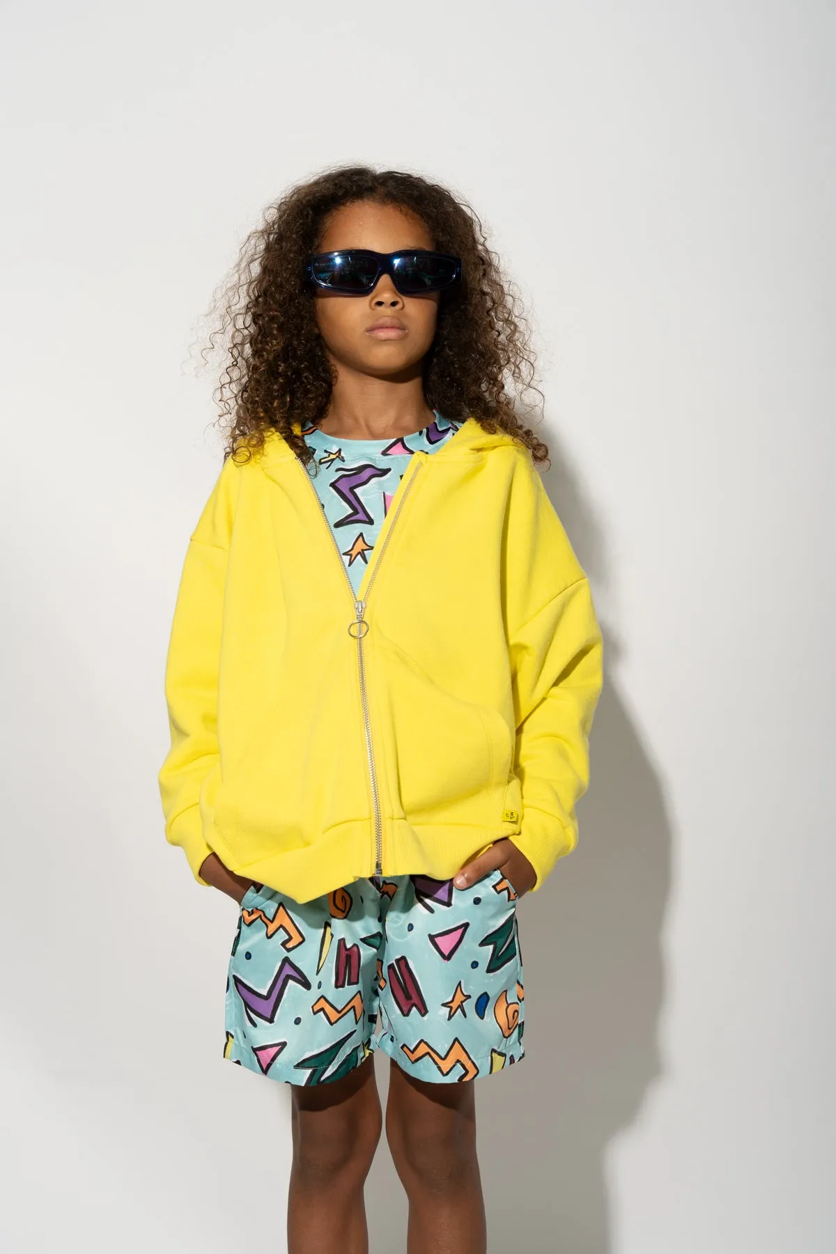 TURQUOISE SQUIGGLE PRINT SWIM SHORT